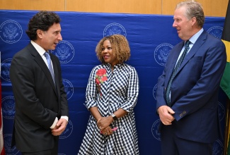 Minister of Education, Skills, Youth and Information, Dr. the Hon. Dana Morris Dixon (second left), in conversation with Regional Representative for Latin America and the Caribbean at the Hague Conference on Private International Law (HCCH), Ignacio Goicoechea (left), and Chargé d'Affaires at the United States Embassy in Kingston, Scott Renner. The occasion was the opening ceremony for the Plenary Session on the Hague Convention on Protection of Children and Co-operation in Respect of Intercountry Adoption, held on September 10 at the Embassy.
