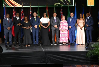 Prime Minister, Dr. the Most Hon. Andrew Holness (fifth right), joins local officials for an official group photograph during the 48th Regional Conference of the Commonwealth Parliamentary Association (CPA) Caribbean, Americas and Atlantic (CAA) Region at Moon Palace Jamaica in St. Ann on Monday (August 31). They include (from left) Leader of Opposition Business in the House of Representatives, Phillip Paulwell; Minister without Portfolio in the Ministry of Economic Growth and Infrastructure Development with responsibility for Works, Hon. Robert Morgan; Minister of Culture, Gender, Entertainment and Sport, Hon. Olivia Grange; President of the Senate, Senator the Hon. Thomas Tavares-Finson; Speaker of the House of Representatives and Chair of the CPA Caribbean, Americas and Atlantic (CAA) Region, the Most Hon. Juliet Holness; Minister of Tourism, Hon. Edmund Bartlett (right); and other dignitaries.

