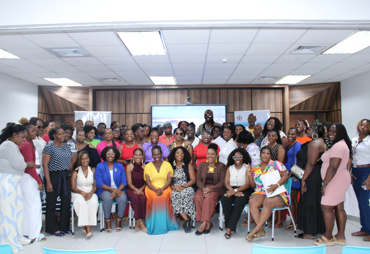 Participants and facilitators of the Project GEAR Shift programme celebrate the successful completion of the parent-training component during the close-out ceremony on July 16.