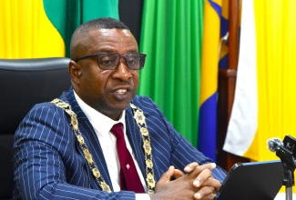 Mayor of Kingston, Councillor Andrew Swaby, speaks during the Kingston and St. Andrew Municipal Corporation’s recent monthly meeting.
