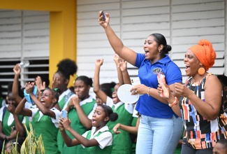 Students and staff at St. Mary High School enjoy the day's activities during Ministry of Justice and Constitutional Affairs' Justice Day in Schools event at the institution on September 18.
