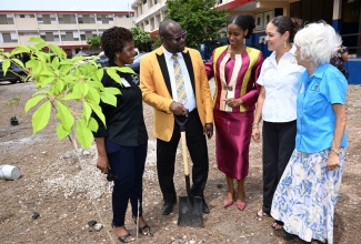 Director, Regional Education Services, Ministry of Education, Skills, Youth and Information, Otis Brown (second left), in discussion with (from left) Technical Specialist, Planning Institute of Jamaica (PIOJ), Kimberley Wellington; Principal of Tavares Gardens Primary School, Terriann Nisbeth; Chief Executive Officer, Jamaica Environment Trust, Dr. Theresa Rodriguez-Moodie, and Chairman, Violence Prevention Alliance (VPA), Dr. Elizabeth Ward, during the official launch of the 2026-2027 Trees for Peace Competition on Monday (September 21) at Tavares Gardens Primary School in Kingston.

