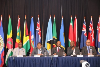Minister of Agriculture, Fisheries and Mining, Hon. Floyd Green (second left), addresses a press briefing during the 20th Caribbean Week of Agriculture at the Ocean Coral Spring Resort in Trelawny on Friday, October 2. He is joined by other Caribbean dignitaries attending the regional event.
