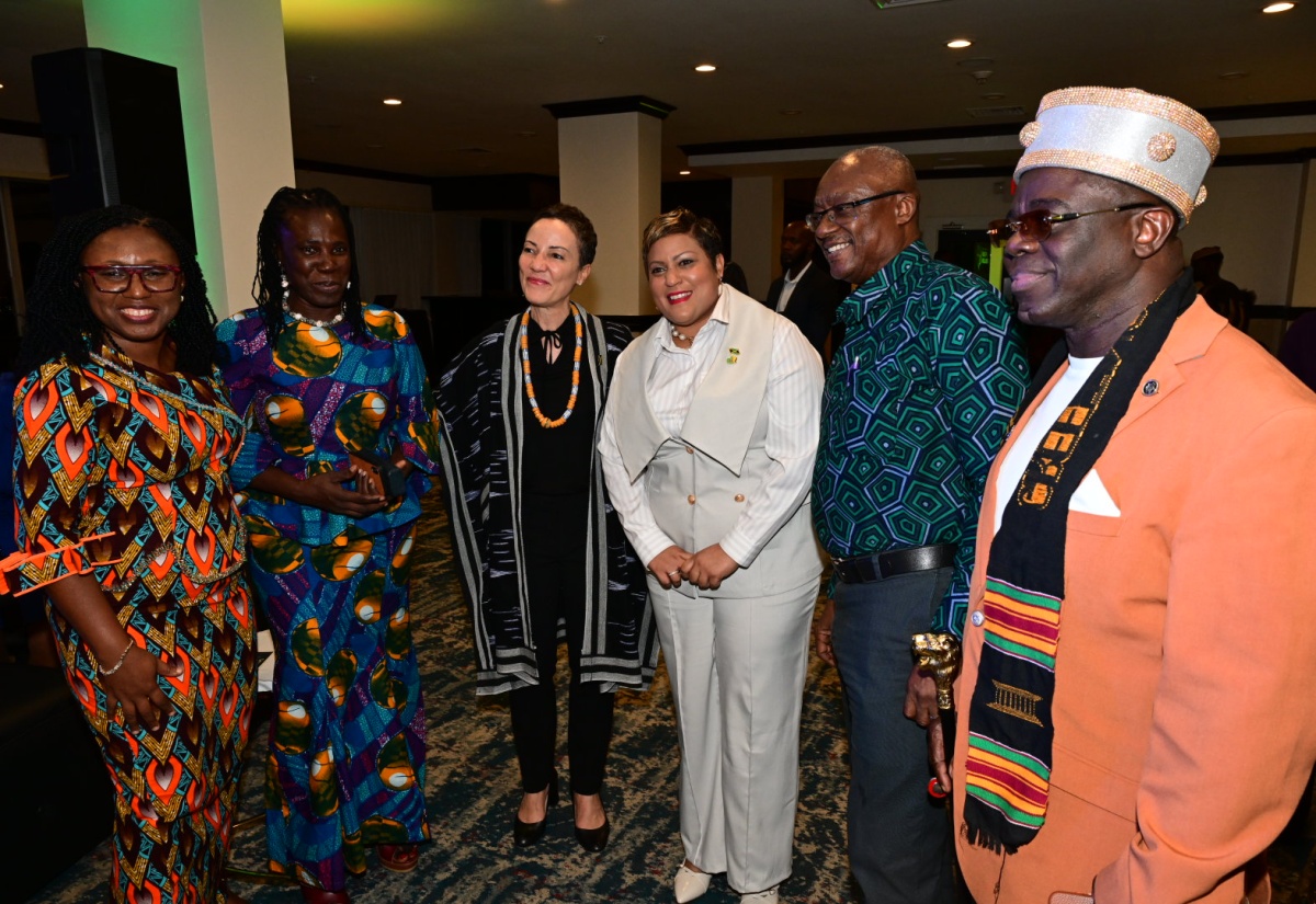 Minister of Foreign Affairs and Foreign Trade, Senator the Hon. Kamina Johnson Smith (third left) and State Minister, Ministry of Health and Wellness, the Hon. Krystal Lee (third right) sharing a moment with (from left) Head of Delegation and Acting Chief Nurse, Evelyn Amoako; nurse specialist, Joana Abaka Yamoah; President, Ghanaian Association of Jamaica, Dr. William Brown and Consultant Physician, Dr. Francis Kpormego. Occasion was a welcome reception in honour of the first cohort of 43 nurse specialists from Ghana on Monday (Sept. 28), at the Jamaica Pegasus Hotel in New Kingston.