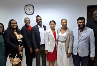 Chief Executive Officer, of the Jamaica Business Development Corporation (JBDC), Daenia Ashpole (third right), shares a photo opportunity with (from left) Manager, Business Advisory Services Unit, JBDC, Melissa Barrett; President, Young Entrepreneurs Association (YEA), Cordell Williams; Second Vice President, MSME Alliance, Shawn Ashman; Council Member, MSME Alliance, Mohan Beckford; President, MSME Alliance, Antoinette Hamilton; President, Small Business Association of Jamaica (SBAJ), Garnett Reid; and Deputy Chief Executive Officer, JBDC, Harold Davis. Occasion was a meeting held at the JBDC's Head Office in Kingston on September 21 to discuss collaborative strategies for strengthening support to micro, small and medium-sized enterprises (MSMEs) and addressing challenges affecting the sector's growth.
