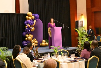 Minister without Portfolio in the Office of the Prime Minister with responsibility for Efficiency, Innovation and Digital Transformation, Ambassador the Hon. Audrey Marks, addresses the chartering ceremony and grand banquet of the Omega Psi Phi Fraternity, Inc.’s Omicron Xi Nu Chapter at the Montego Bay Convention Centre in Rose Hall, St. James, on Saturday (October 10).
