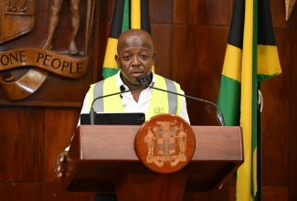 Minister of Labour and Social Security, Hon. Pearnel Charles Jr., delivers remarks during Wednesday’s (October 28) post-cabinet press briefing at Jamaica House in St. Andrew.
