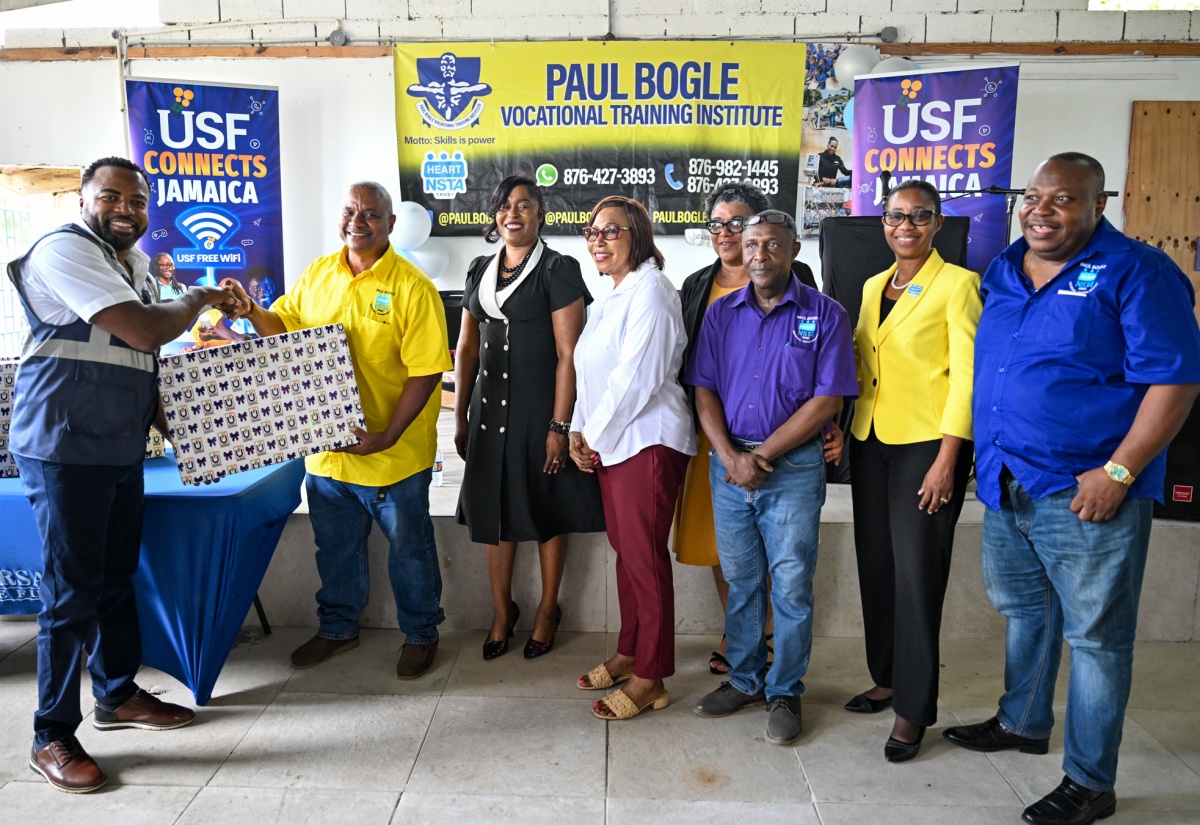 USF Hands Over Computers to Paul Bogle VTI