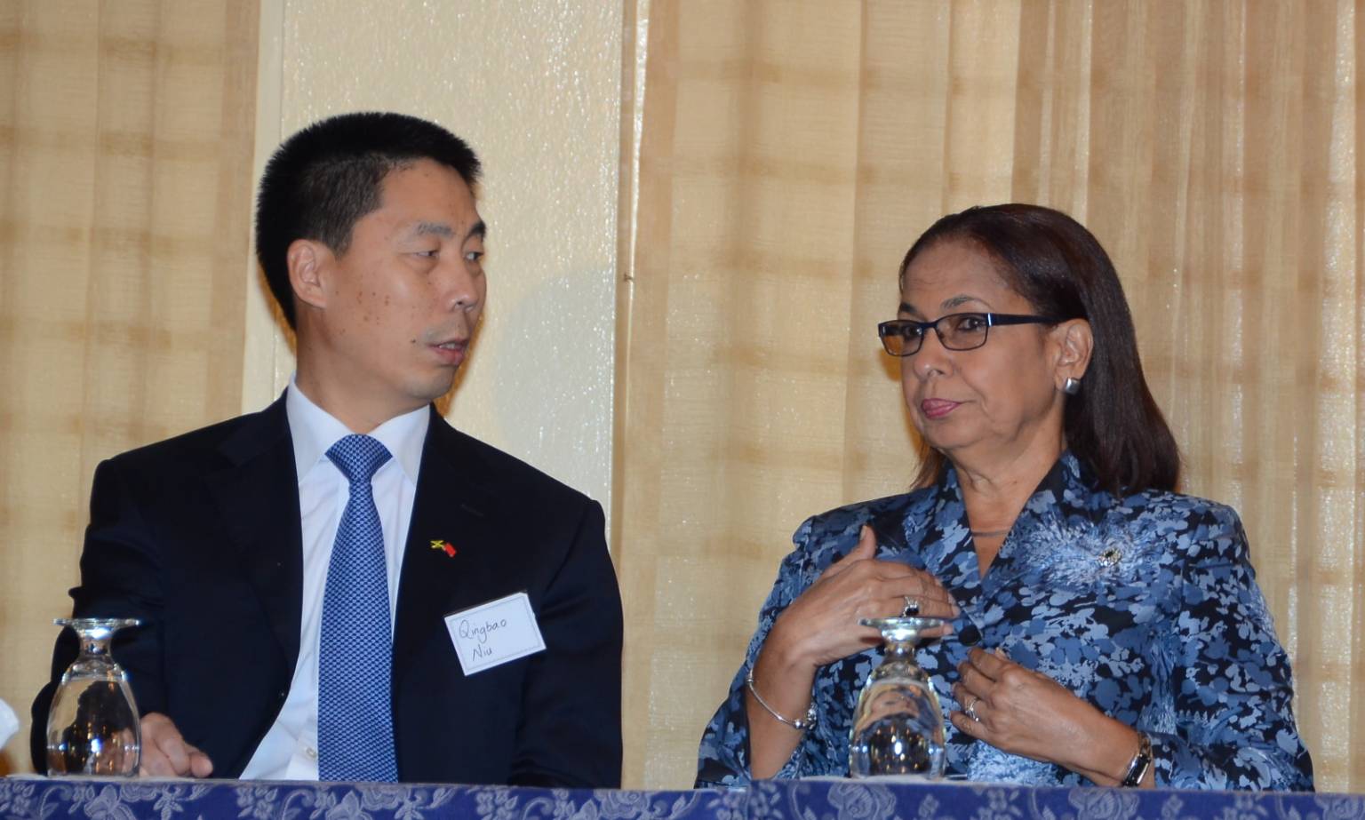 Minister of Labour and Social Security, Hon. Shahine Robinson (right), is in discussion with Ambassador of the People’s Republic of China to Jamaica, His Excellency Niu Qingbao, during the opening ceremony for the Regional Disability Studies Conference on March 16, at the Mona campus of the University of the West Indies (UWI).