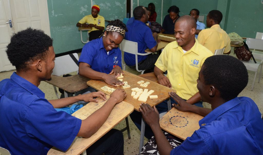 Participants of the Dominoes for Life Concept, competes in a  cut-throat domino tournament.