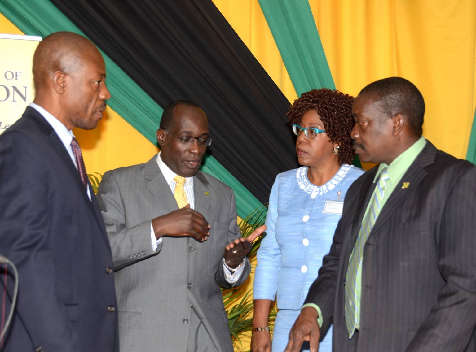 Minister of Education, Youth and Information, Senator the Hon. Ruel Reid (2nd left), has the attention of Minister of National Security, Hon. Robert Montague (right); Commissioner of Police, Dr. Carl Williams; and Chairman of the HEART/NTA Maxine Wilson. The occasion was a Security and Ethics Conference held at the Jamaica Pegasus Hotel in New Kingston on June 14.