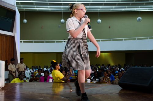 Young Tahalia Mitchell performs a dub poetry piece during today’s (June 19) staging of the Unite For Change National Forum on Youth Violence Prevention at the Jamaica Conference Centre in downtown Kingston.