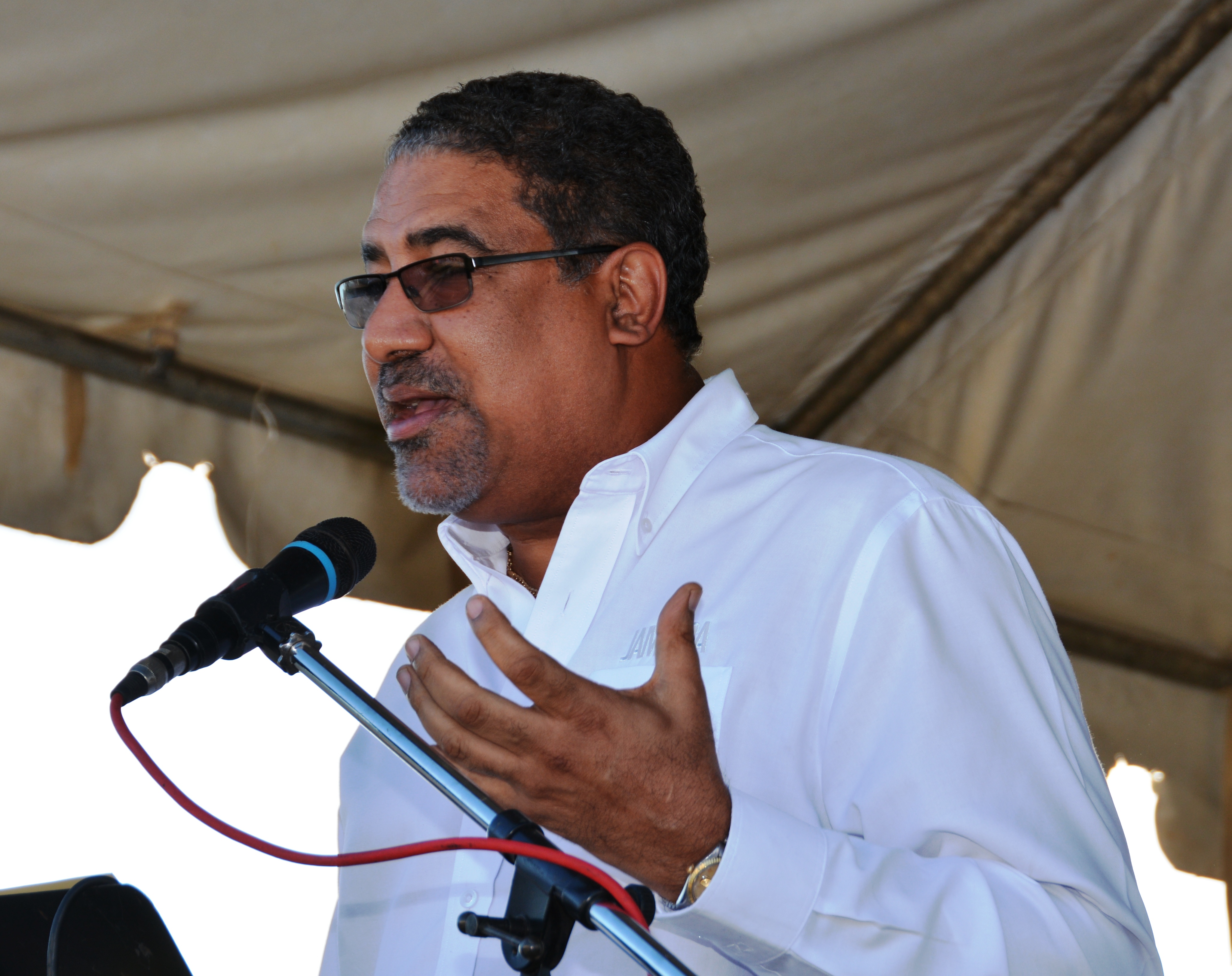 Minister of Tourism, Hon. Dr. Wykeham McNeill addresses visitors  during the  celebration to mark the 278th  anniversary of the signing of the Peace Treaty between the Maroons and  the British government and the birthday of Captain Kojo of the Trelawny Town Maroons Sovereign State of Accompong, on January 6,  in St. Elizabeth.