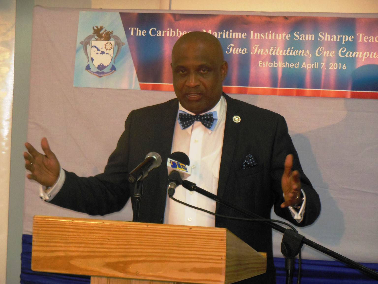 Executive Director of the Caribbean Maritime Institute (CMI), Dr. Fritz Pinnock, addresses the launch of the CMI/Sam Sharpe Teachers’ College Campus in Granville, St. James on April 7.