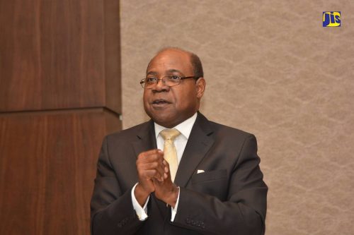 Tourism Minister, Hon. Edmund Bartlett, addressing a recent St. Ann Chamber of Commerce luncheon at the Moon Palace Jamaica Grande Resort in Ocho Rios.