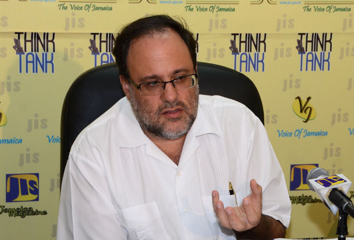 Minister of Justice, Senator  the Hon. Mark Golding, explains the different elements of the pending restorative justice legislation, at a JIS ‘Think Tank’ on February 3. 