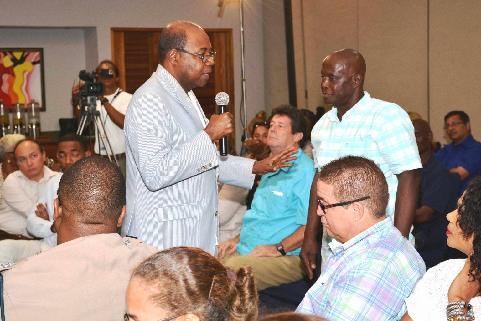 Minister of Tourism, Hon. Edmund Bartlett (left), assures  tourism stakeholders  that the immediate economic fallout from the United Kingdom’s exit from the European Union (BREXIT),  will not be severe .  The Minister  met with the stakeholders at Swept Away Resort Hotel in Negril on June 24.