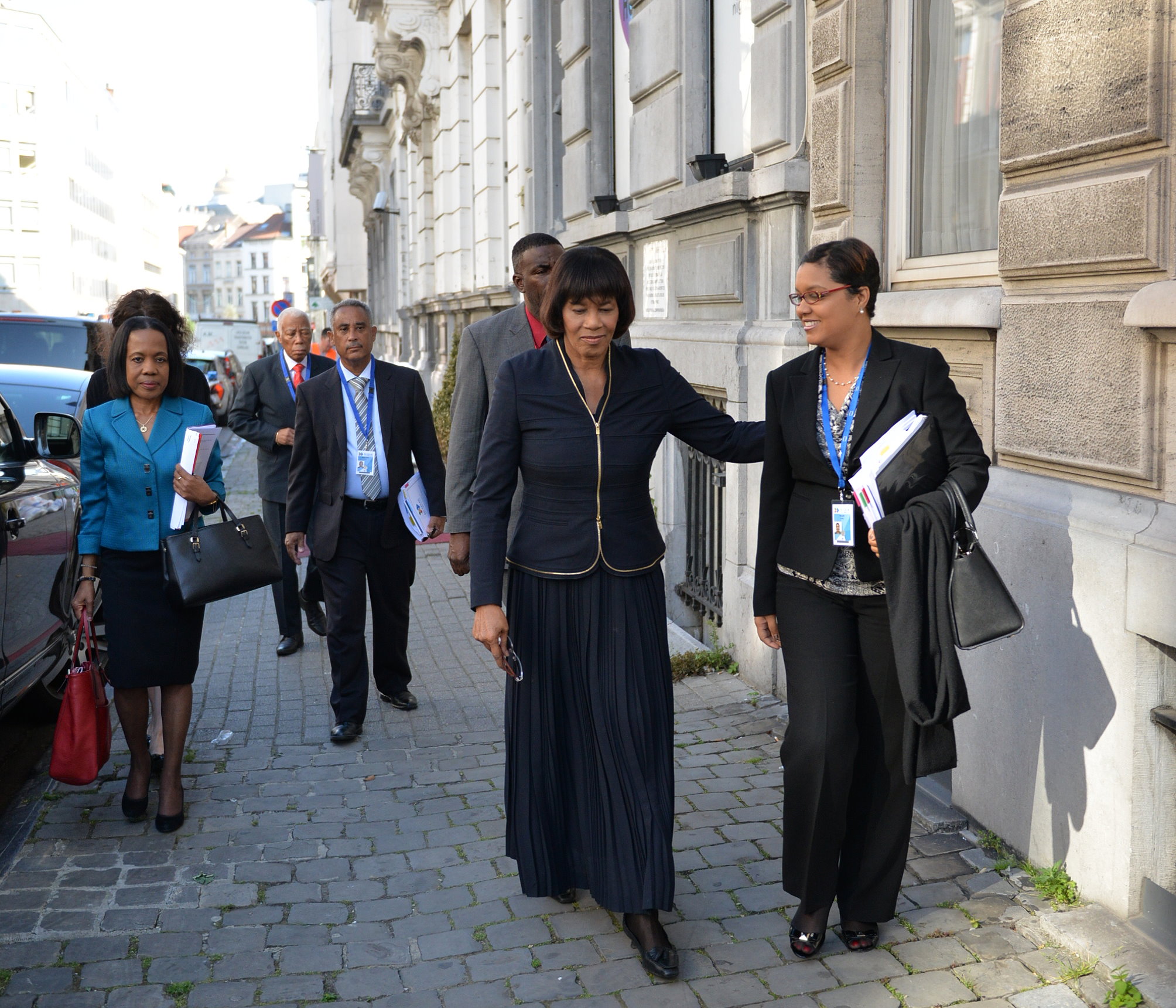 Prime Minister, the Most Hon. Portia Simpson Miller (2ndright), leads her delegation of senior officials of the Office of the Prime Minister and the Ministry of Foreign Affairs and Foreign Trade on arrival in Brussels, Belgium to attend a caucus meeting of Heads of State and Government of the Caribbean Community (CARICOM) at the Mission of the Organization of Eastern Caribbean States on Wednesday (June 10). The meeting of CARICOM leaders was to review the agenda and discuss national and regional positions ahead of the opening of the second summit of the European Union (EU) and the Community of Latin America and the Caribbean (CELAC), which takes place in that European city from June 10 to 11. Others from right are Permanent Secretary in the Office of the Prime Minister,  Onika Miller; a member of the Prime Minister’s personal protection team; Permanent Secretary in the Ministry of Foreign Affairs and Foreign Trade, Ambassador Paul Robotham; Minister of Foreign Affairs and Foreign Trade, Senator AJ Nicholson; and Jamaica’s Ambassador to the European Union, Vilma McNish. 