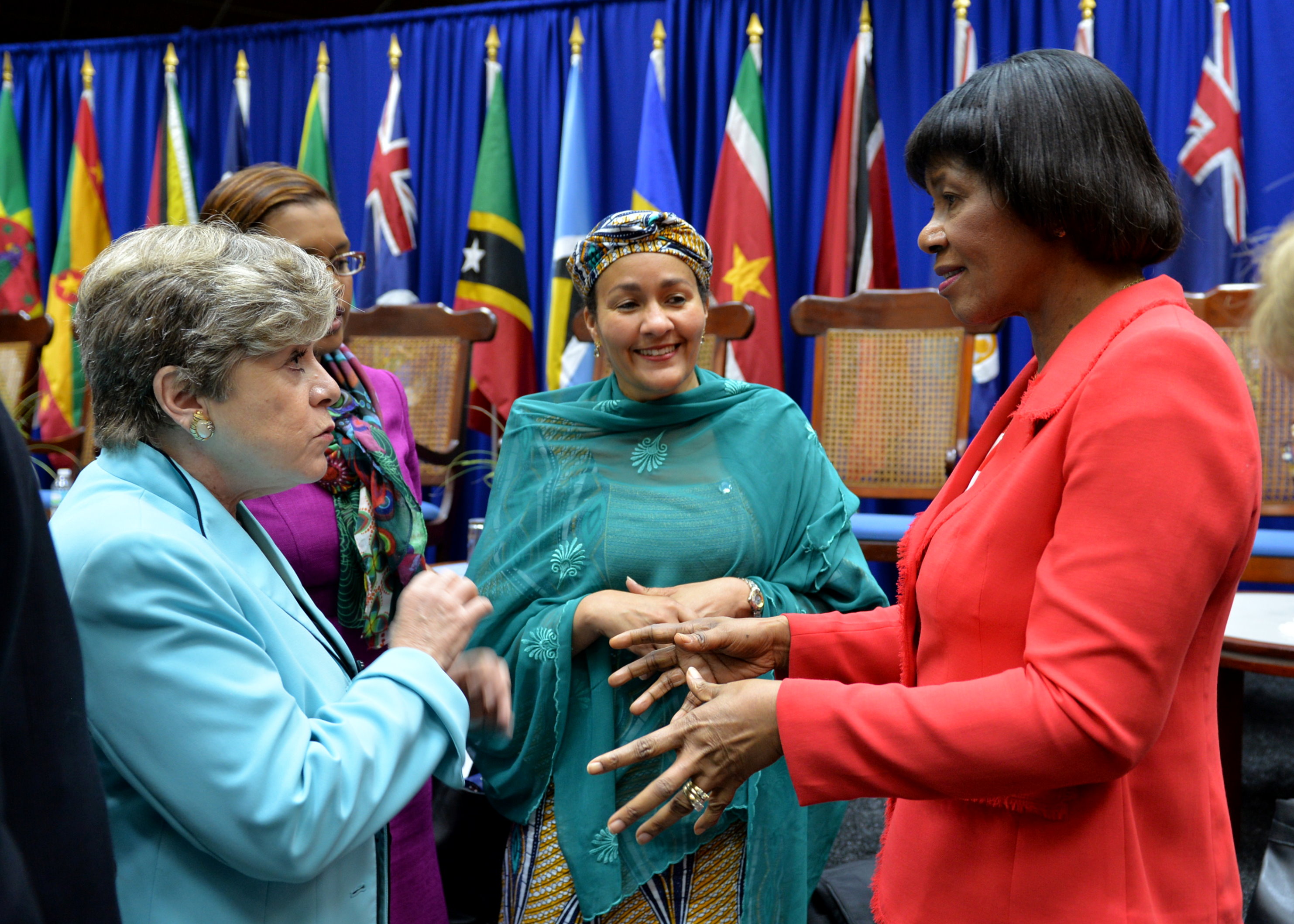 PM GIVES EDUCATION UPDATE AT CARICOM DIALOGUE: Prime Minister Portia Simpson Miller provides an update on policies and actions by the Government of Jamaica to demonstrate tangible support for improved education and training in Jamaica as she speaks with Executive Secretary of the United Nations (UN) Economic Commission on Latin America and the Caribbean (ECLAC) Alicia Barcena (left); the UN Secretary-General’s Special Adviser on Post-2015 Development Planning Amina Mohammed (second right), and Permanent Secretary in the Office of the Prime Minister Onika Miller (second left). The conversation followed a High-Level Strategic Dialogue on the topic, “CARICOM: Vibrant Societies; Resilient Economies” at the Lloyd Erskine Sandiford Centre in Barbados on Thursday (July 2). During the Dialogue, which was held before the formal meeting of the 36th Regular Meeting of Heads of Government of the Caribbean Community, the Executive Secretary of ECLAC pointed to Jamaica as a country in the regional grouping which was making significant progress in financing education.