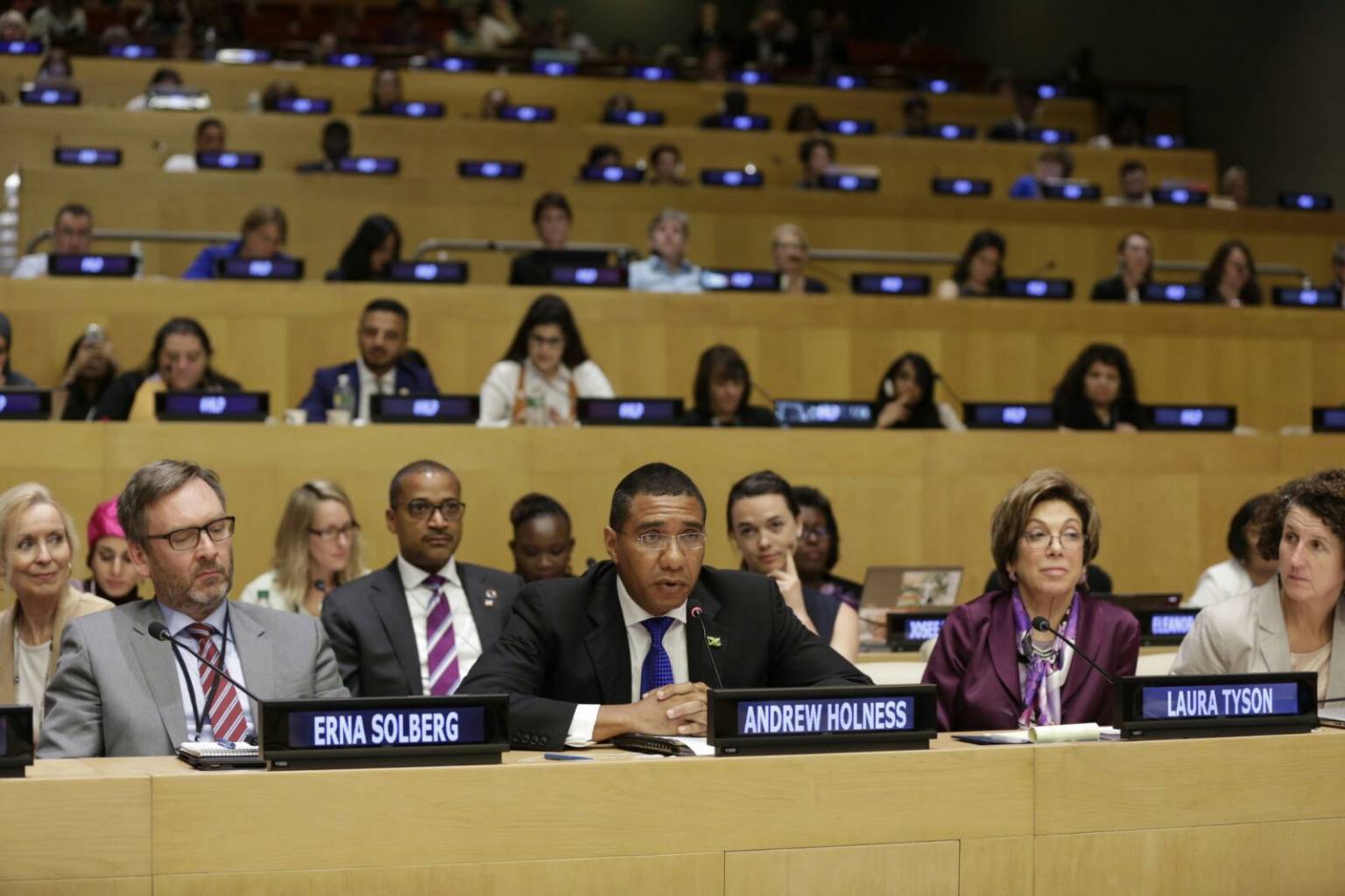 Prime Minister Andrew Holness announces Jamaica’s ratification of the ILO Convention C 189 (also known as Domestic Workers Convention) during his participation in the deliberations on a report by the United Nations High Level Panel on Economic Empowerment of Women at UN Headquarters in New York on Thursday, September 22. Seated behind the Prime Minister is Jamaica’s Permanent Representative to the United Nations (UN) Ambassador Courtenay Rattray. 