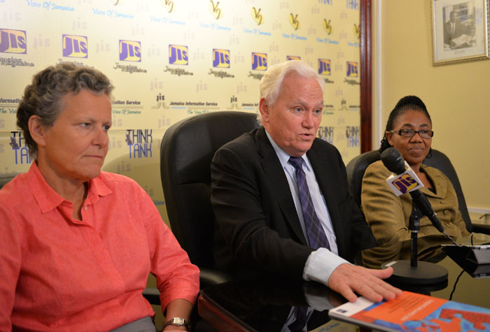 Former Minister of State Owned Enterprises in New Zealand, Hon. Richard Prebble (centre), speaking at a JIS ‘Think Tank’ on July 21. Others (from left) are:  Co-Author of the Asian Development Bank (ADB) publication, ‘Finding Balance 2014: Benchmarking the performance of State-Owned Enterprises in Island Countries’, Miss Laure Darcy  and Deputy Financial Secretary with responsibility for Public Enterprises in the Ministry of Finance and Planning, Ann-Marie Rhoden (right). Mr. Prebble and Ms. Darcy are in Jamaica to present the findings of the report to Policy makers and Senior executives of the Government.