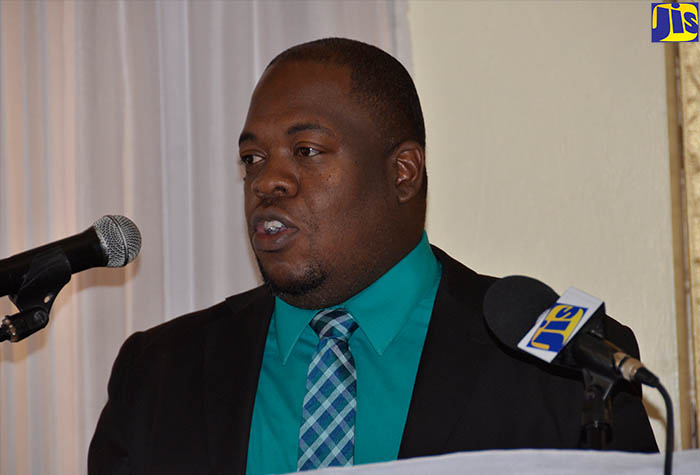 Education Officer for the Ministry of Education, Youth and Information’s Region IV, Stokely Reid, addresses male students at a one-day conference for teenage schoolboys staged by the University of the West Indies’ (UWI) Open Campus in Montego Bay, held on February 21 at the Grandiosa Hotel in the Second City.