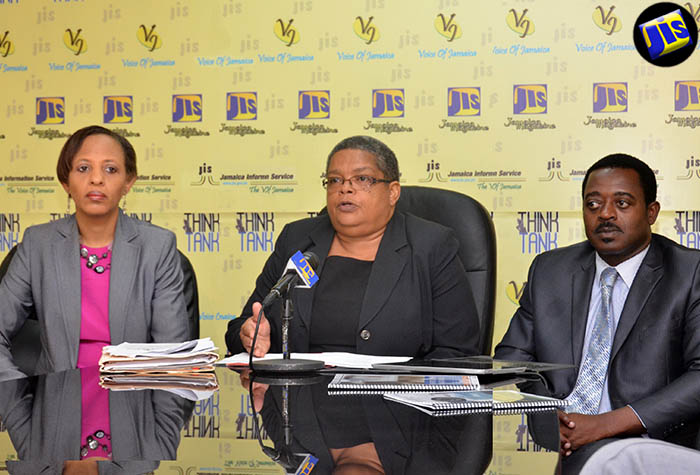 Chairperson for the National Task Force Against Trafficking in Persons (NATFATIP), Carol Palmer (centre), addresses JIS ‘Think Tank’ on July 5.  Others (from left) are Senior Deputy Director of Public Prosecutions, Lisa Palmer Hamilton and Head of the Anti-Trafficking in Persons Unit, Deputy Superintendent of Police Carl Berry.