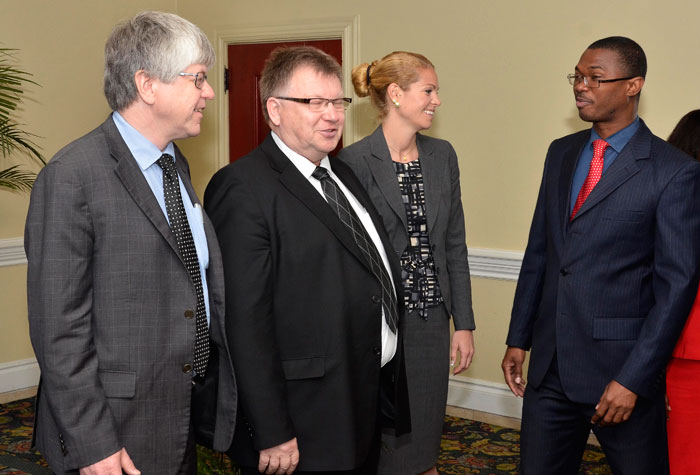 State Minister for Foreign Affairs and Foreign Trade, Hon. Arnaldo Brown (right), speaks with World Trade Organization (WTO) Facilitators (from left): Lead Facilitator, Helge Lindrup; Leif-Ottar Pettersen; and Helene Hval. Occasion was the opening ceremony for the National Self-assessment of Needs and Priorities exercise under the World Trade Organization (WTO) Trade Facilitation Agreement, held at the Knutsford Court Hotel in New Kingston on Monday, May 26.