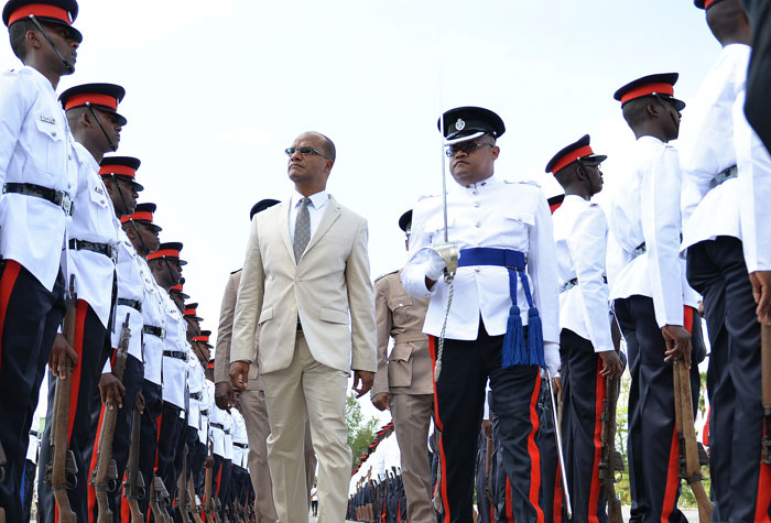 Minister of National Security, teh Hon. Peter Bunting, inspects the guard at the Jamaica Police Academy, in 
St. Catherine, where 195 new members were added to the Jamaica Constabulary Force (JCF).