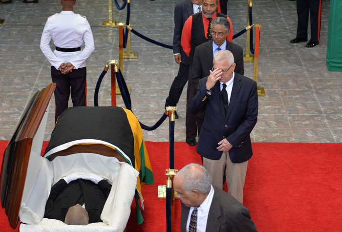 Cabinet Members, Jamaicans Pay Respects To Sir Howard