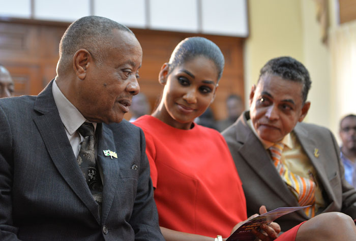 Hon. Derrick Kellier (left), Minister of Labour and Social Security has the ears of Hon. Lisa Hanna, Minister of Youth and Culture and Hon. Noel Arscott, Minister of Local Government and Community Development during the launch of Workers Week and Labour Day 2014 on Wednesday, May 7 at Jamaica House.  Minister Kellier delivered the Prime Minister’s address. Workers Week (May 18-23) and Labour Day (May 23) is being observed under the theme ‘Take A Stand…Beautify Our Land’.
The National Labour Day Project will be at the Climate Change Park in Portmore while the parish projects will focus on the renovation of police stations across the island. 
