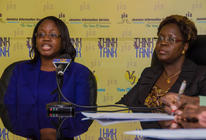 Acting Director of the Legal Services Unit in the Ministry of Labour and Social Security, Camille Bennett-Campbell (left), speaking at a JIS ‘Think Tank’, on Wednesday, November 26, on the rights of workers under the Flexible Work Legislation. Beside her is Director of the Pay and Conditions of Employment Branch of the Ministry,  Faylene Foster. 