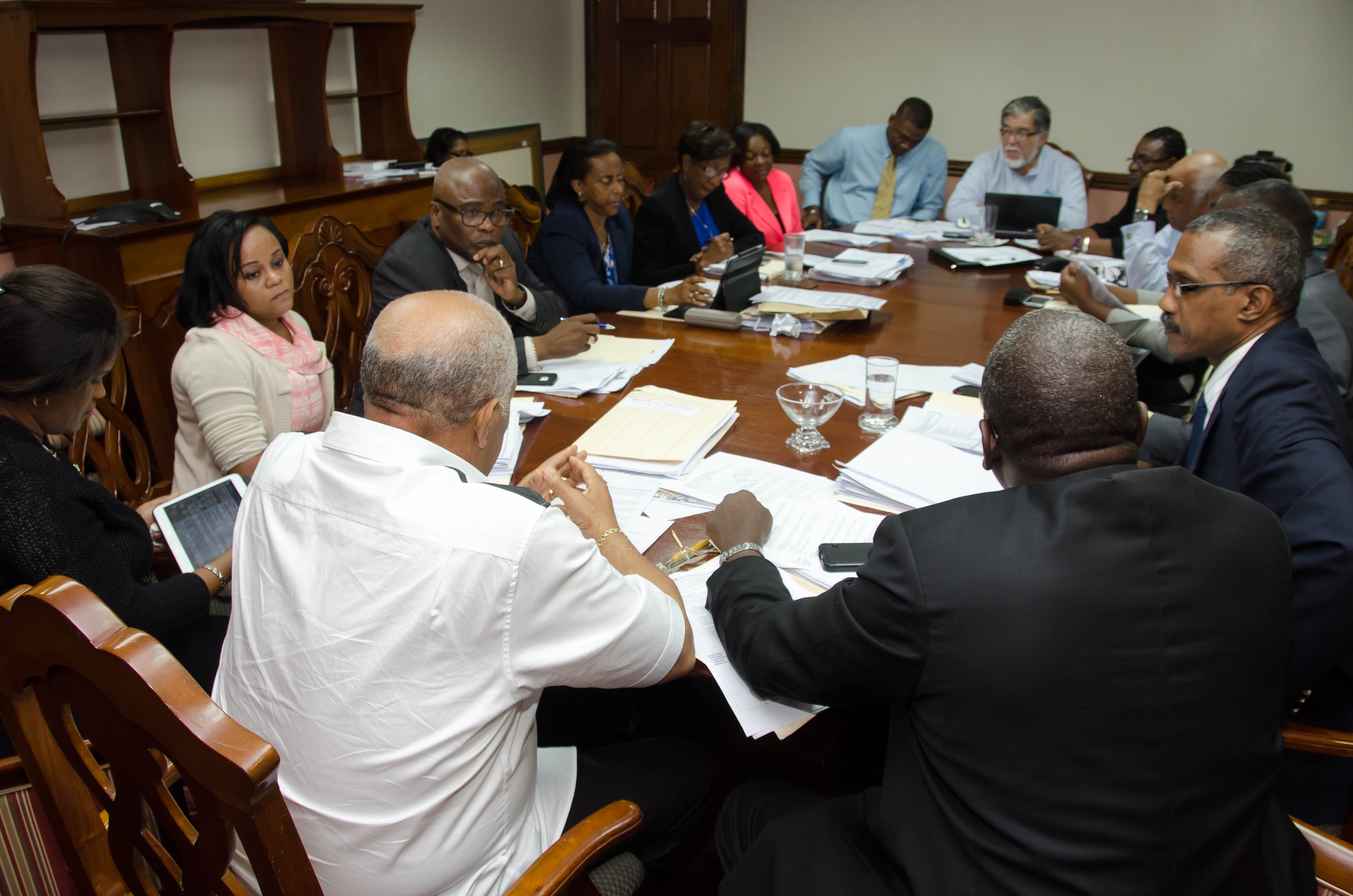 Minister of Water, Land, Environment and Climate Change,  Hon. Robert Pickersgill (centre), chairing a Heads of Agencies meeting at the Ministry, in Kingston, on December 16. 