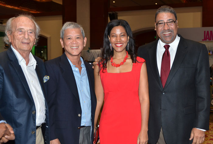 Tourism and Entertainment Minister, Hon. Dr. Wykeham McNeill  (right),  with (from left): former Jamaica Hotel and Tourist Association (JHTA) President, Heinz Simonitsch; Chairman and CEO of the National Baking Company,  Kevin  Hendrickson, and President of the JHTA, Nicola Madden Greig, at the 2015 launch of the Jamaica Product Exchange (JAPEX) Tourism Trade Show, at the Montego Bay Convention Centre, in St. James, on Sunday, September 20.

