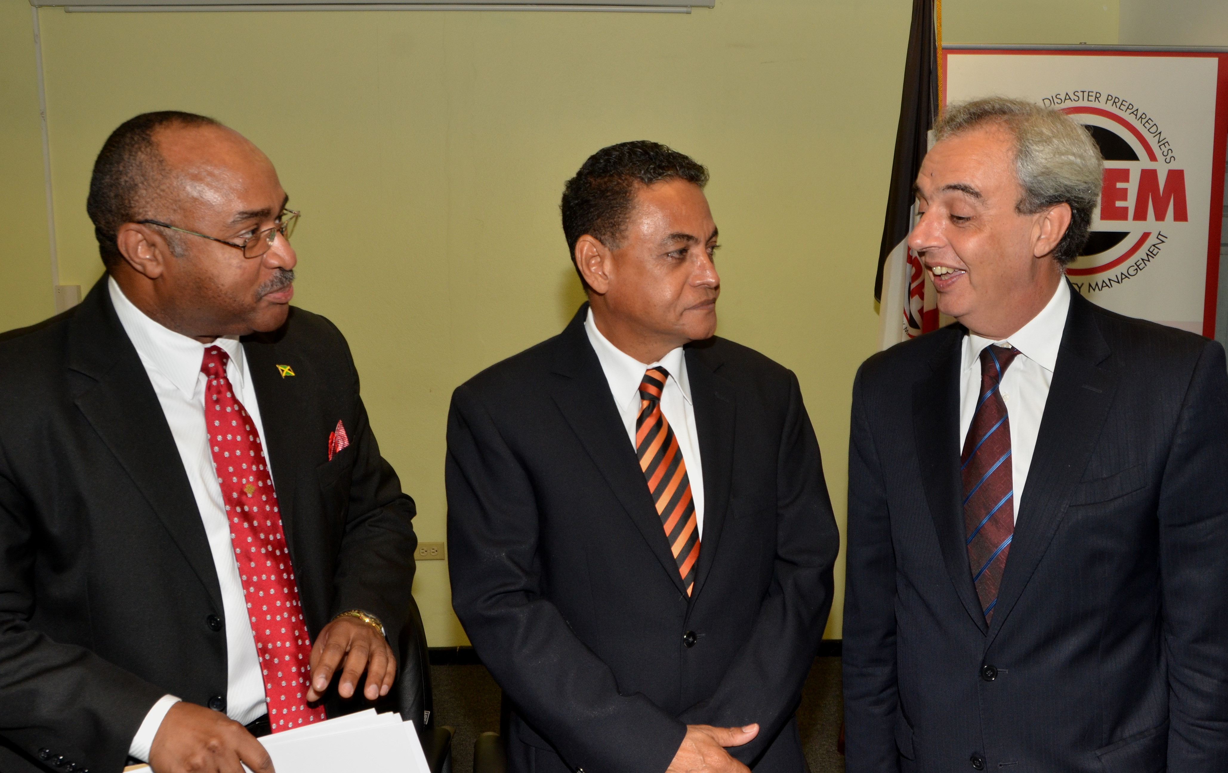 Minister of Local Government and Community Development, Hon. Noel Arscott (centre); and  Director General, Office of Disaster Preparedness and Emergency Management (ODPEM), Major Clive Davis, listen to  a comment from Ambassador of Argentina to Jamaica, His Excellency Ariel Fernandez. Occasion was the launch of Earthquake Awareness Month 2016 on January 5, at the ODPEM’s offices in Kingston.