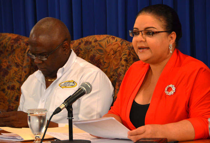 Minister with Responsibility for Information, Senator the Hon. Sandrea Falconer addresses journalists at a Jamaica House press briefing at the Office of the Prime Minister on November 20. Seated beside her is Managing Director of the JUTC, Colin Campbell.