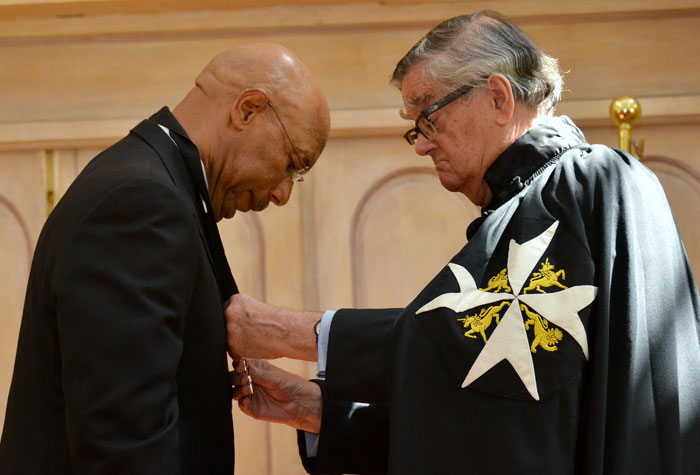 Governor General, His Excellency the Most Hon. Sir Patrick Allen (left), is being invested as Knight of Grace of the Most Venerable Order of the Hospital of St. John of Jerusalem, by Lord Prior of the Order of St. John, Professor Anthony Mellows. The investiture ceremony was held on September 2 at King’s House.
