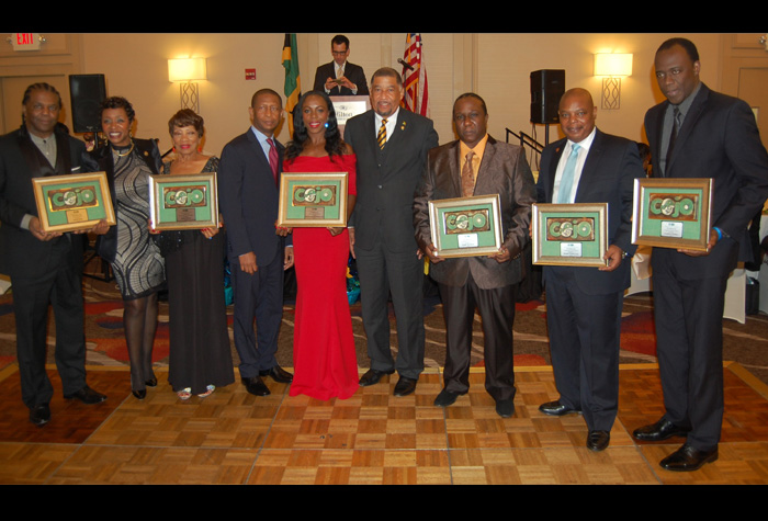 Jamaica’s Ambassador to the United States, His Excellency Ralph Thomas (centre); United States Congresswoman, Yvette Clarke (2nd left); and President of Children of Jamaica Outreach (COJO), Gary Williams (4th left), shares with COJO’s 2015 honourees, at the organisation’s 21st annual Awards and Scholarship Gala held at the JFK Airport, Hilton New York hotel in Queens recently. The honourees are (from left): Trevor Smith, representing Visionary awardee Patrick Jolley; Madge Warren, Distinguished Service awardee; Olympian Veronica Campbell Brown, who received the Humanitarian Award; Oliver McKenzie and Attorney Donald Vernon, who received the Community Service Award; and Carl Stuart, who received the Corporate Award for Caribbean Airlines.