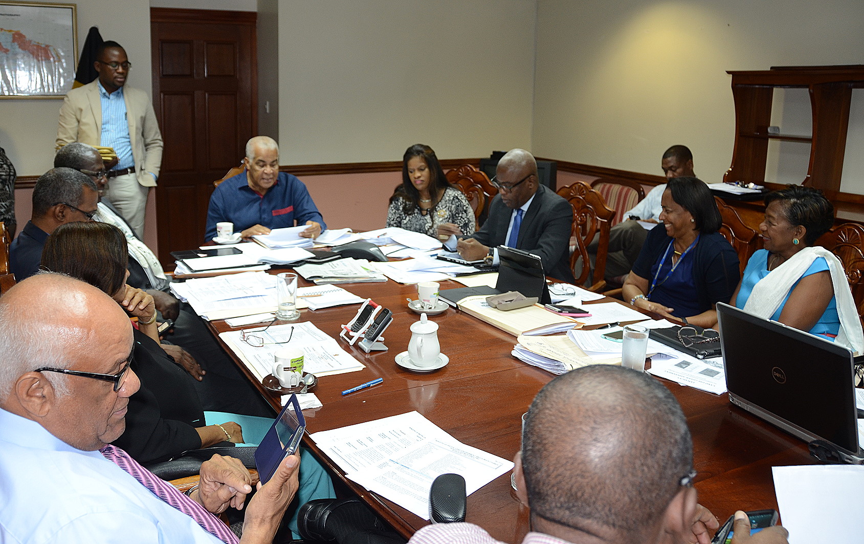 Minister of Water, Land, Environment and Climate Change, Hon. Robert Pickersgill (sixth left), addresses a meeting of heads of agencies and department, held recently, at the Ministry in Kingston.
