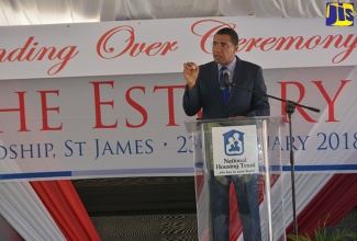 Prime Minister the Most Hon. Andrew Holness delivering the keynote address at a ceremony to hand over keys for units at The Estuary, Friendship, St. James on February 23.