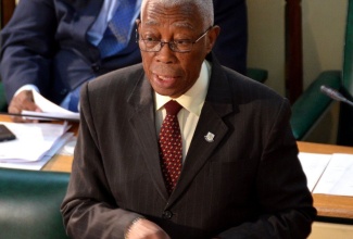 Minister of Foreign Affairs and Foreign Trade, Senator the Hon. A.J. Nicholson, stresses a point as he opens the debate on the Caribbean Community (Free Movement of Skilled Persons) (Amendment) Act, 2013 in the Senate on Friday (October 18).