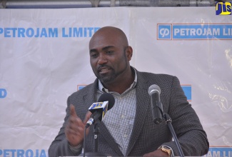 Minister of Science, Energy and Technology, Dr. the Hon. Andrew Wheatley, addresses the official opening of Petrojam Limited’s new administrative offices in the Montego Bay Freeport on Tuesday (January 9).