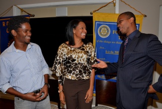 State Minister for Foreign Affairs and Foreign Trade, Hon Arnaldo Brown (right), shares pleasantries with Vice President, Trafalgar New Heights Rotary Club, Kerry Spencer (centre), and President-elect, Horace Matthews, during the club’s weekly meeting at CRU Bar Complex, Lady Musgrave Road, St. Andrew, on January 15. Mr. Brown, who was the guest speaker, addressed matters pertaining to the recently announced re-establishment of diplomatic relations between the United States of America, and Cuba.