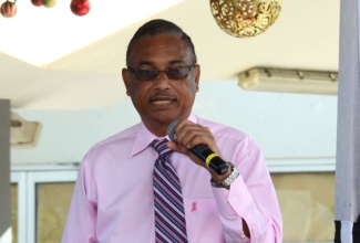 Dr. Patrick Bhoorasingh, Senior Medical Officer, KPH speaking at the launch of the Norman Manley International Airport Palisadoes Charity 5K Walk /Run on January 3.   