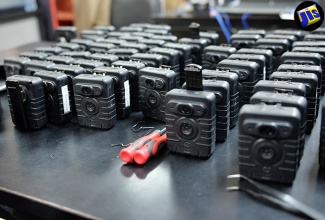 Body-worn cameras on display during the launch of the project, at the Police Commissioner’s Office, in St. Andrew, on August 25.