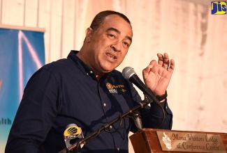 Minister of Health, Dr. the Hon. Christopher Tufton, addresses the National Non-Communicable Disease Prevention and Control Programme’s fifth annual review and capacity building workshop at the Mona Visitors’ Lodge, St. Andrew, on Thursday (March 8). 