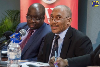 Chairman of the Third Technical Vocational Education and Training (TVET) in the Caribbean, Professor Halden Morris, addressing Wednesday’s press launch at the University of the West Indies’ Mona Campus in St. Andrew on Wednesday, April 26. At left is Education Programme Specialist, United Nations Educational, Scientific and Cultural Organization, Dr. Claude Akpabie. 