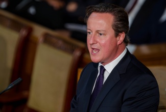 Prime Minister of the United Kingdom, the Rt. Hon. David Cameron, addresses a Joint Sitting of Parliament at Gordon House on Wednesday, September 30. 