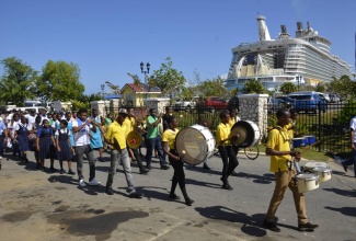 Members of the Spot Valley High School Marching Band from St. James leading a procession around the town of Falmouth in Trelawny, during the Tourism Ministry’s ‘Falmouth Invasion’ sensitization exposition and concert in February.