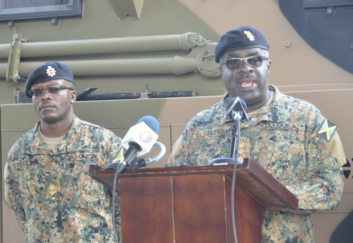 Colonel General Staff of the Jamaica Defence Force (JDF), Colonel Daniel Pryce (right), gives an update on security operations under the Public State of Emergency in St. James at a press conference at at Burke Barracks in Montego Bay on Saturday (Jan. 20).  At left is Commanding Officer of the Second Battalion, the Jamaica Regiment (2JR), Lieutenant Colonel Godphey Sterling. 